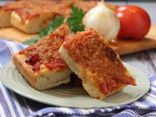 https://orsararecipes.net/wp-content/uploads/2019/10/Sicilian-Pizza-Topped-with-Tomatoes-and-Onions-500x375.jpg