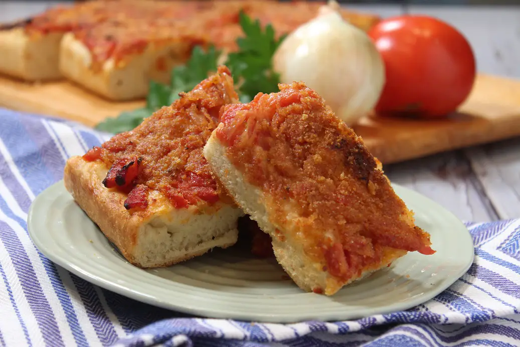 Sfincione (Sicilian New Years Pizza with Bread Crumbs, Onions, and